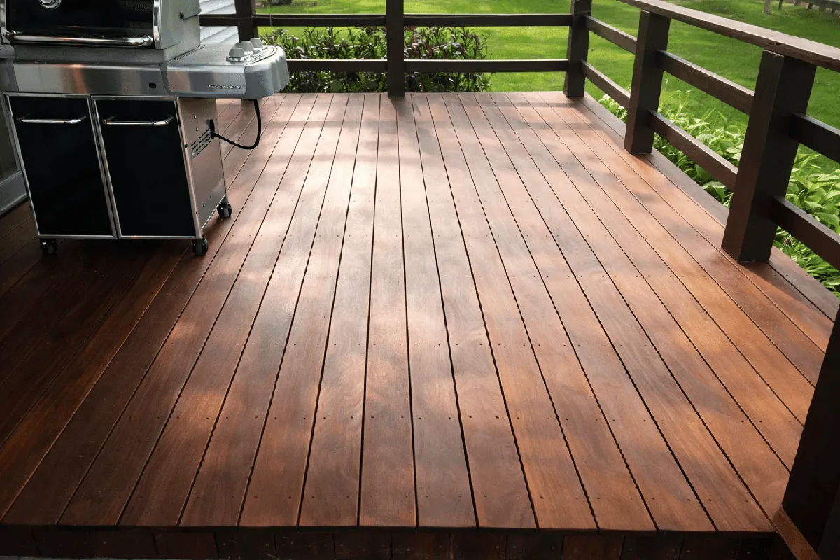 Freshly cleaned and restored wooden deck with rich natural finish by Brite Site Pressure Washing